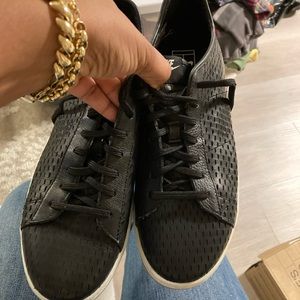 Black leather Nike tennis sneakers